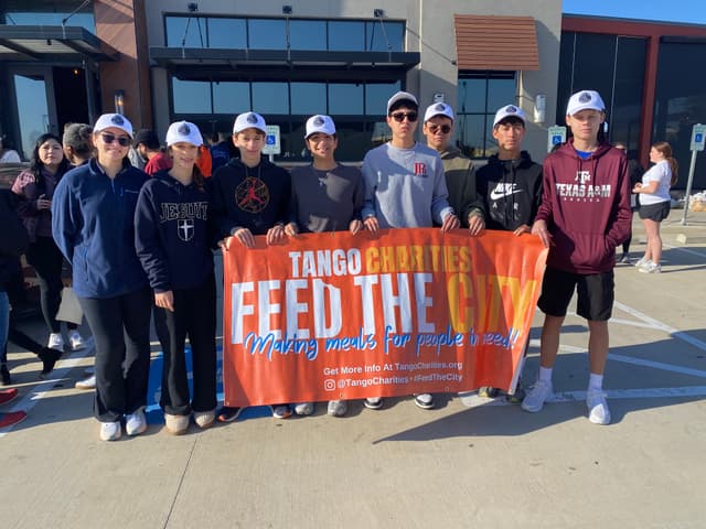 Group photo at Feed the City Plano event